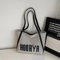 Minimalist grey canvas tote bag with black leather handles and HOOAYA letter print - Black