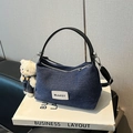Deep blue denim handbag with black leather handles and cute plush bear charm accessory - With Pendant / Denim Black