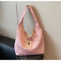 Detail of pink plaid tote bag with cotton drawstring bow and handmade woven label - Pink