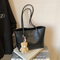 Black faux leather tote bag with FASHION label and brown teddy bear charm on straps - Black With Pendant