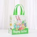 Detailed view of durable Easter non-woven gift bag with rabbit prints and green handles - Wreath Bunny and Floral Style (5023-5) / Green