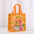 Orange Happy Easter non-woven gift bag with rabbit and floral prints on white surface - Bunny Ears and Egg Basket Style (5023-4) / Orange