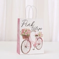 Detail of white kraft paper gift bag featuring pink tulip bicycle and rope handles - Pink Bicycle and Tulip Style (466-2)