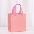 Sac cadeau rose en intissé avec poignées renforcées et soufflets latéraux extensibles - 23*22*11 / Orange Macaron