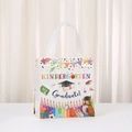 White non-woven kindergarten graduation gift bag with colorful rainbow school supplies - 20*20*9