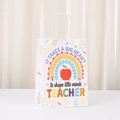 Laminated non-woven Teacher's Day gift bag with rainbow apple design and white handles - Heart Education Style (470-5) / 21cmx15cmx8cm