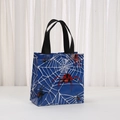 Detail of blue non-woven Halloween spider web gift bag with durable black handles - Blue Base Red Spider Style (9029-4)