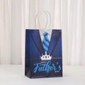 Father's Day gift bag with blue suit design, crown pattern, and white rope handles - Dark Blue Suit Tie and Crown (471-6) / 21x15x8cm