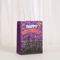 Purple superhero themed birthday paper gift bag with comic style motifs and city silhouette - Purple Comic Happy Birthday Style (476-4)