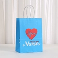 Close-up of blue paper gift bag with 'Thank you Nurses' text and heartbeat design - Blue ECG Style (483-6) / 21x15x8cm