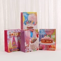 Set of four colorful happy birthday gift bags with assorted festive patterns and rope handles - Small / 4 Patterns Mixed