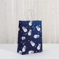 Close-up of blue Christmas paper gift bag with snowman patterns and white rope handles - Snowman Forest Winter Style (042-6)