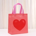 Pink waterproof non-woven gift bag with a large red heart print and ribbon handles - 23x22x11 / Pink