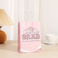 Detail view of a pink graduation gift bag with 'Congrats GRAD' text and white handle - Pink Twill Doctoral Hat Style (389-2)