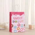 Pink kraft paper gift bag featuring sweet donut prints and white cord handles for party favors - Pink SWEET DONUT Style (424-3) / Pink