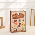 Detail of Wild West themed kraft paper gift bag with cowboy illustrations and white handle - Wanted Poster and Sheriff Badge Style (340-4) / 21x15x8