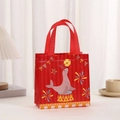 Detail of red non-woven gift bag with circus seal print and durable carry handles - Red Seal (9017-10) / 20*20*9