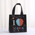 Detail of black non-woven science themed gift bag with reinforced carry handles - I Love Science Style (9018-7)