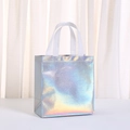 Detail of silver laser non-woven gift bag showing holographic rainbow effect and handles - Rainbow Laser Silver
