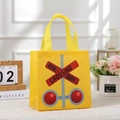 Yellow non-woven gift bag with RAIL CROSSING WAY icon, perfect for festive shopping and gifts - Yellow Traffic Sign Style (9009-3)