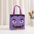 Lila Halloween Vlies-Geschenktüte mit Vampirdruck und Tragegriffen für Party Süßigkeiten - Lila (Vampir)