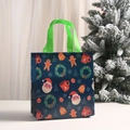 Christmas non-woven gift tote bag featuring Santa and gingerbread man on dark blue base - Dark Blue Christmas Mix (5008-7)