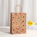 Brown kraft paper gift bag with red and black hearts and twisted paper handles - Vintage Graffiti Heart Style (702-2)