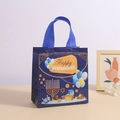 Detail of Hanukkah non-woven gift bag with Happy Hanukkah print and festive illustrations - Dark Blue Festive Design (5010-10)