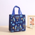 Detail of Hanukkah non-woven gift bag with Menorah and Star of David prints - Blue Happy Hanukkah Hebrew (5010-5)