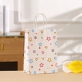 Bolsa de regalo de papel kraft blanco con estrellas de colores y asas de cuerda fuertes - Estrella Colorida / 21x15x8cm