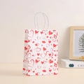 White kraft paper gift bag with red heart patterns and sturdy twisted white rope handles - Red Mixed Hearts Style (369-1)