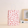 White kraft paper gift bag with red lip print and XOXO text for romantic occasions - Lip Print XOXO Style (369-3)