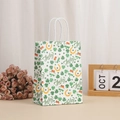 Lucky clover paper gift bag with horseshoe print and white handles for St. Patrick's Day - Lucky Letters White Background Style (370-4)