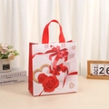 Red and white non-woven gift bag with rose prints and sturdy red handles for holidays - Red Rose and White Gift Box Pattern (4009-4) / L
