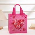 Sac cadeau rose en non-tissé avec motif de cœurs et poignées de transport solides - H23xL22xW11 / Style 4002-2 (4002-2)