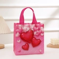 Sac cadeau rose en intissé avec motifs de cœurs rouges et anses tressées pour cadeaux - H23xL22xW11 / Style 4002-4 (4002-4)
