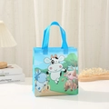 Blue non-woven gift bag with cartoon cow pattern and bright blue handles for kids - 29x27x12 / Blue - Cows