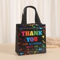Black non-woven gift bag with rainbow Thank You text and colorful splatter design - THANK YOU FOR GLOWING WITH ME Style