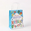 Close-up of blue paper birthday gift bag with white woven rope handles and festive prints - Blue Invitation Style (113-4)