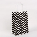 Detail of kraft paper gift bag with black wave patterns and white twisted handles - 21cmx15cmx8cm / Wave Black