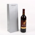 Vertical silver matte wine gift bag with grey rope handle shown with a standard bottle - Silver