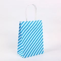 Blue and white diagonal stripe kraft paper gift bag with white twisted rope handles - Light Blue