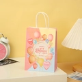 Detail of colorful birthday kraft paper gift bag with happy birthday text and rope handle - Pink Yellow Balloon Blessing Style (606-2)