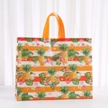 Detail of large non-woven tote bag with orange stripes and tropical pineapple print - Orange Striped Pineapple Printed Style (GW1001-4) / 43*33*13cm