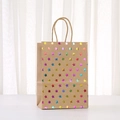 Detail of kraft paper gift bag with colorful glitter stars and woven handles - Star / 21x15x8cm