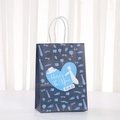Detail view of Father's Day paper gift bag with blue tie motifs and heart pattern - Navy Blue Heart Festival Wishes Style (575-1)
