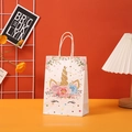 Detail of white unicorn party gift bag with gold glitter horn and twisted paper handles - Gold Horn Unicorn (403-1)