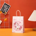 Detailed view of a pink unicorn gift bag with soft woven handles for birthdays - Dreamy Pink Unicorn (401-4)