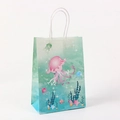 Detail of paper gift bag featuring colorful jellyfish prints and white twisted rope handles - Blue-Green Gradient Jellyfish Style (212-6)