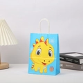 Close-up of bright blue kraft paper party bag with a cute yellow dinosaur print - 21x15x5 / Blue